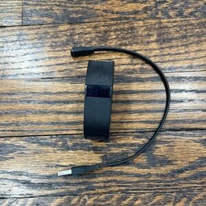 Black Fitbit with Charging Cable